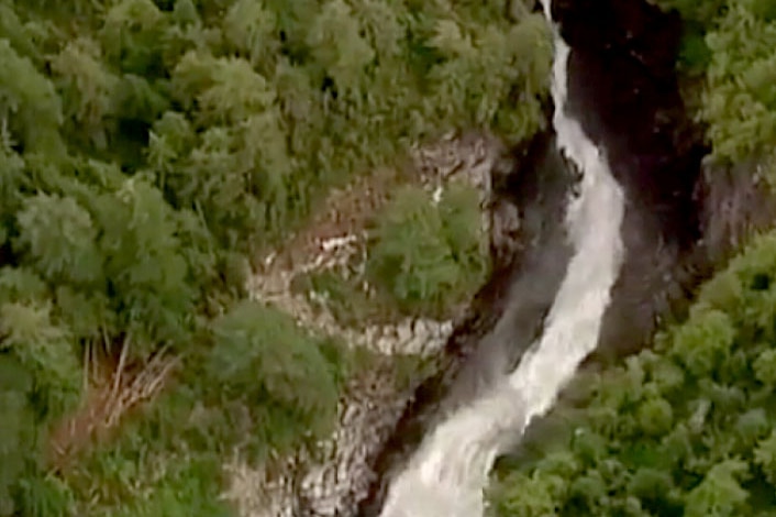 An aerial view of a treacherous waterfall near Harrison Lake in British Columbia.