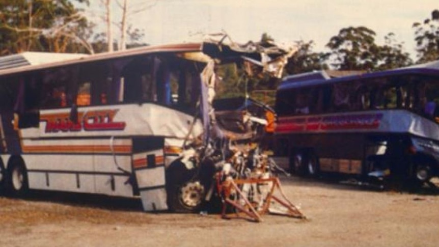 An old colour picture of a smashed bus that had been involved in a crash