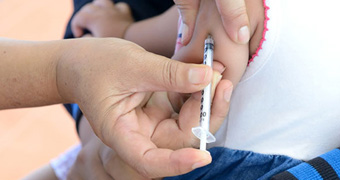 Child getting immunised