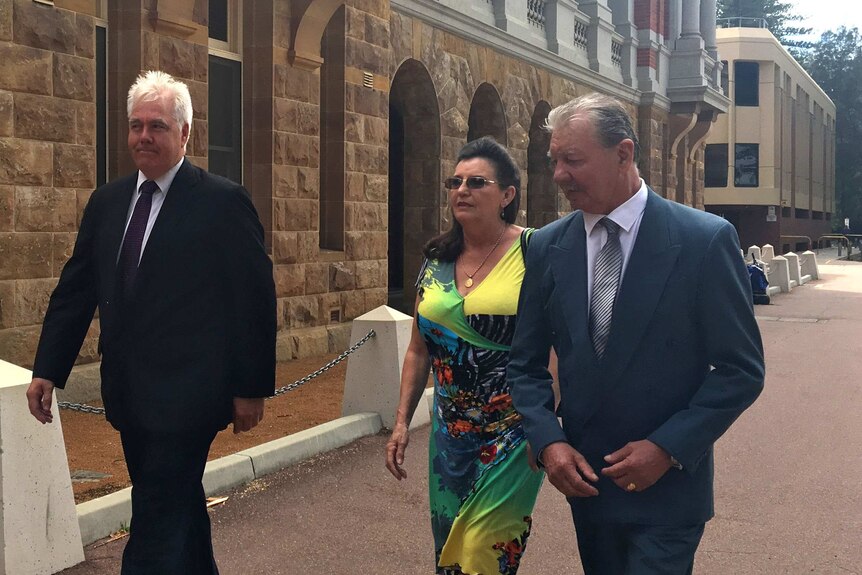 Margaret Dodd, Ray Dodd and Anthony Fels walking outside the Supreme Court in Perth.