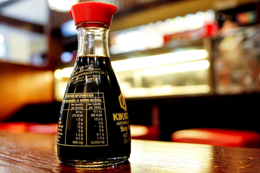 Bottle of soy sauce at restaurant.