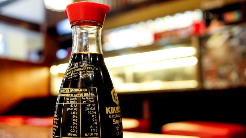 Bottle of soy sauce at restaurant.