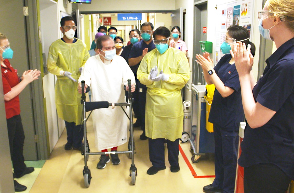 David Avila Mellado walking out of hospital