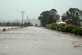 Floods cover road