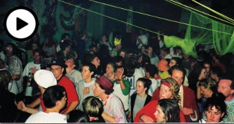 A full dancefloor at a 90s rave