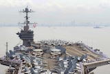 Show of strength: the aircraft carrier USS George Washington