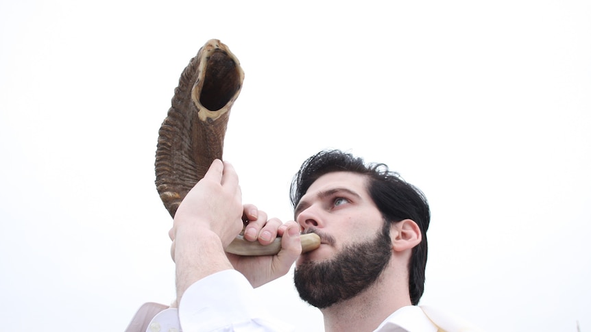 Blowing the sacred Jewish shofar, or ram's horn