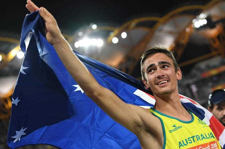 Brandon Starc celebrates his gold medal win.