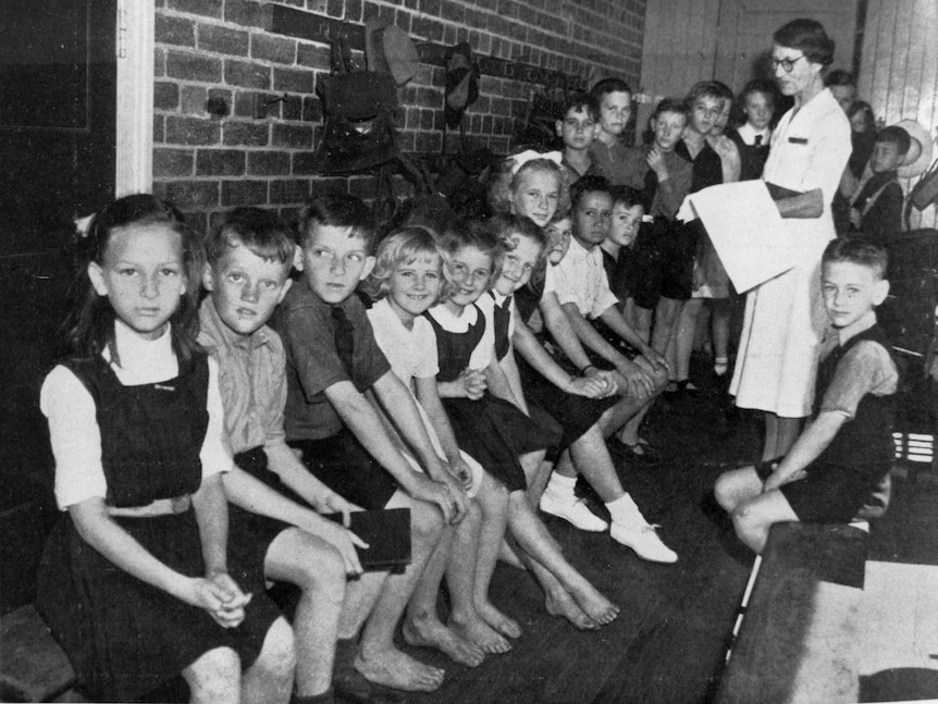 Brisbane schoolchildren waiting to be immunised against diphtheria, 1943