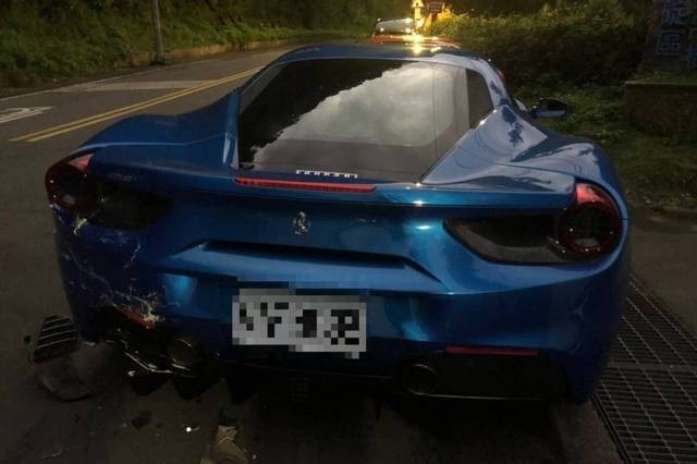 Bumper damage to the blue Ferrari.