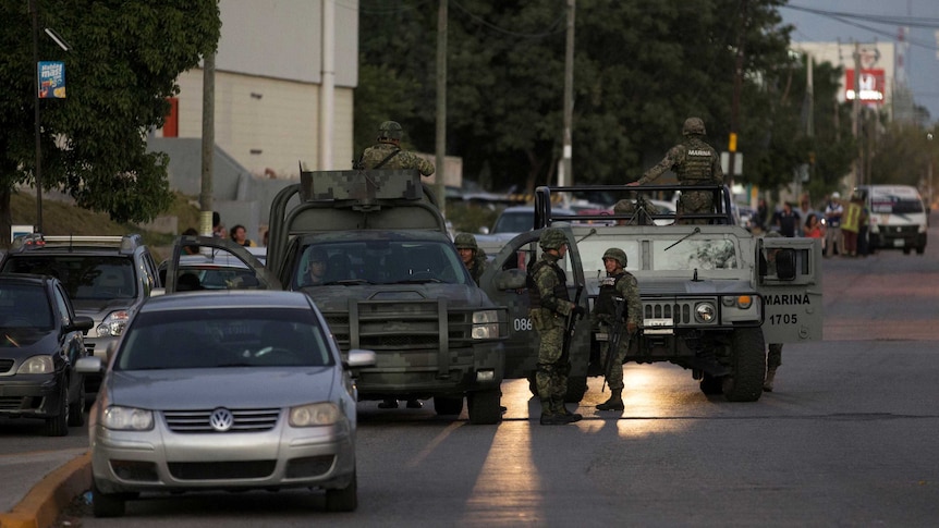 Soldiers guard the perimeter