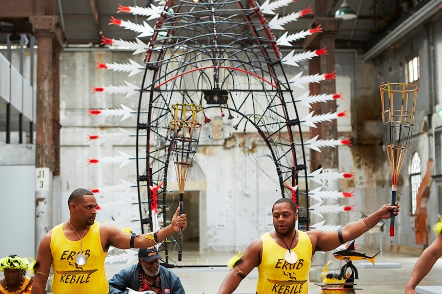 a giant sculpture of a headdress with feathers