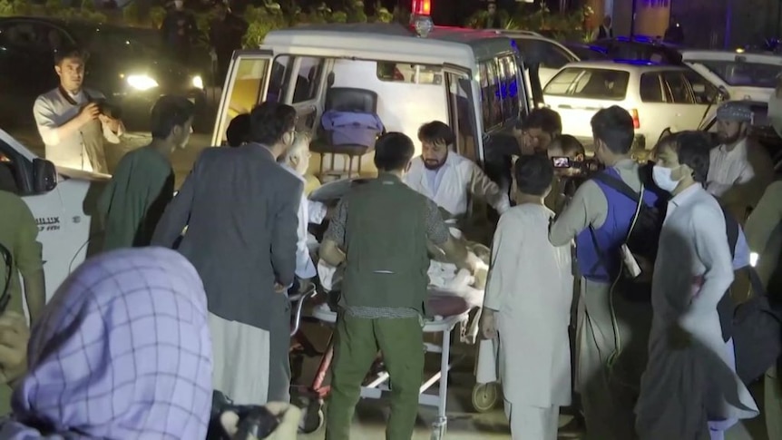 Injured Afghans arrive at hospital after Kabul blasts