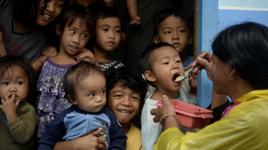 Evacuees at the Barangay health centre