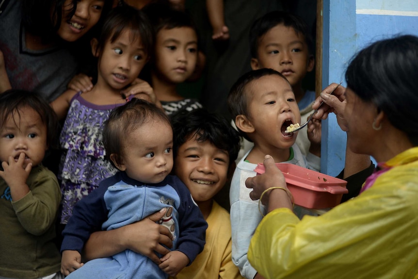 Evacuees at the Barangay health centre