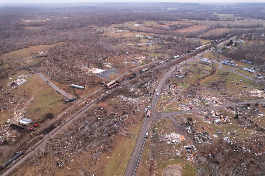 Aerial view of flattened homes and trees in Kentucky.