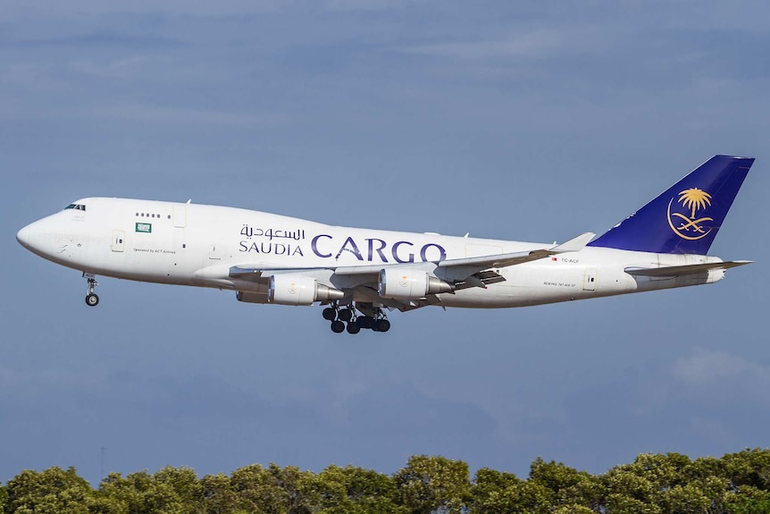 A Saudia Cargo Boeing 744F arriving at Brisbane