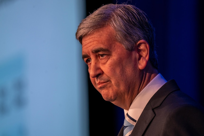 Rob Lucas in profile inside the Adelaide Convention Centre handing down the 2021-22 State budget.