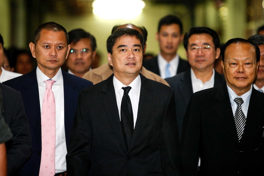 Abhisit arrives in court