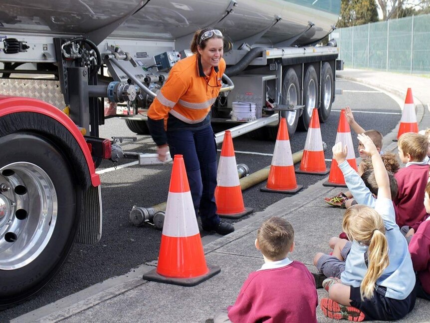 Kerri Connors explains to school children her job as the driver of a fuel tanker