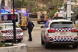 Police and fire authorities at scene of a suspicious fire inside Mr Percival's bar at Howard Smith Wharves in Brisbane.