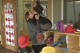 Amy Smith dropping her son off at Childcare in Nowra.