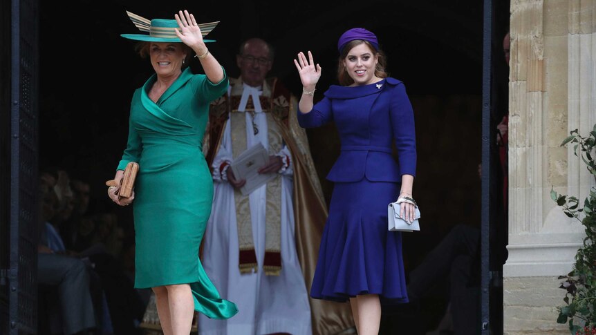 Sarah Ferguson and her daughter Princess Beatrice wave before entering St George's Chapel.