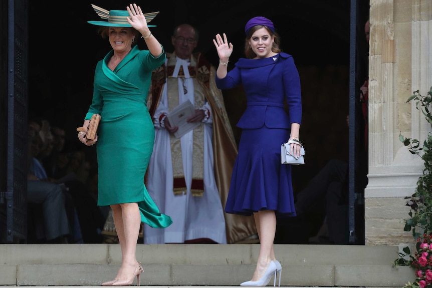Sarah Ferguson and her daughter Princess Beatrice wave before entering St George's Chapel.