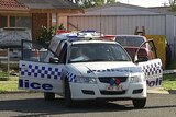 A police car outside a house in Melbourne