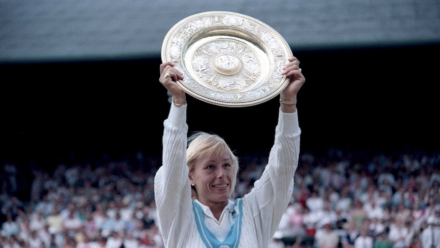 Martina Navratilova with the Wimbledon trophy.