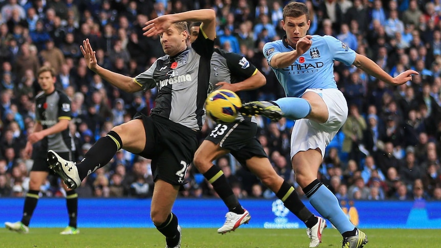 Manchester City's Edin Dzeko scored a sumptuous winner to down Spurs 2-1.