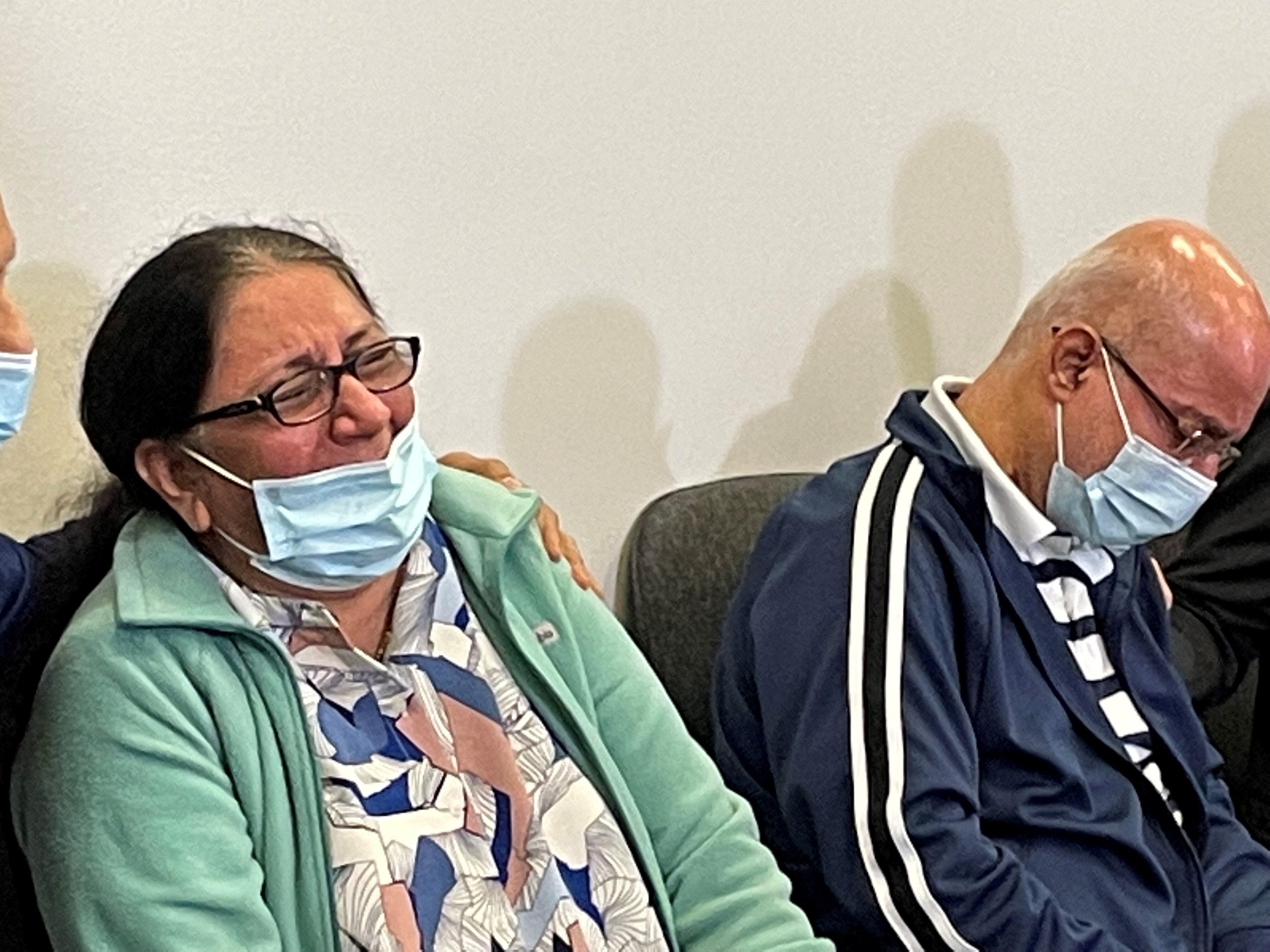 Victim's mother is seen crying at a news conference talking about her daughter's death. 