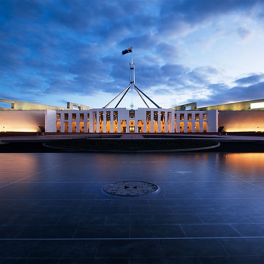 Evening sky over a white building, parliament house, in Canberra