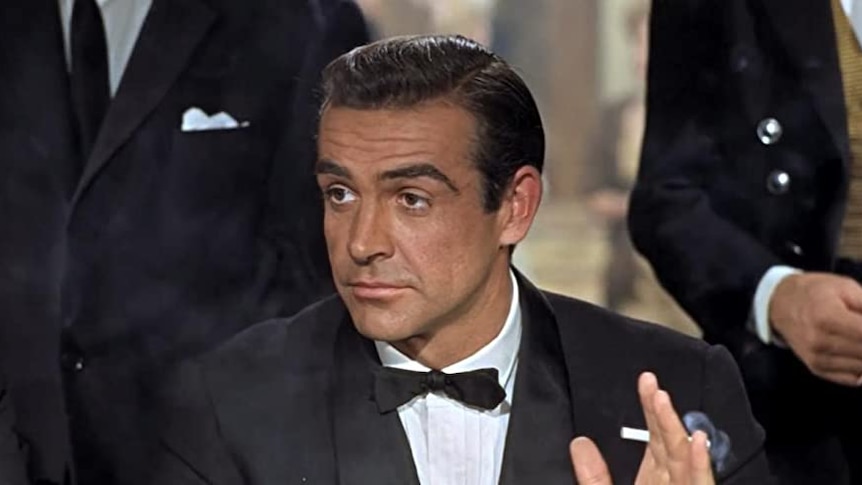Sean Connery as James Bond wearing a tuxedo.