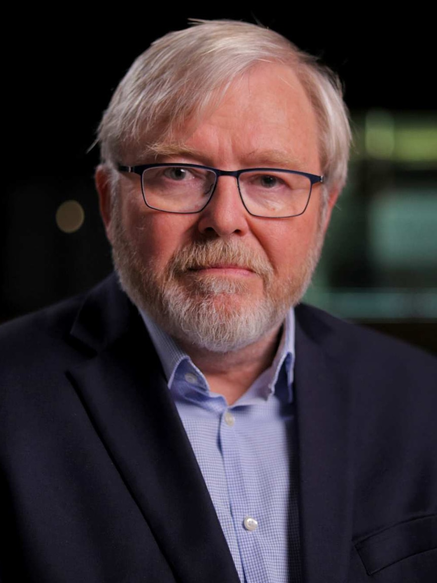 Kevin Rudd dressed in a blue shirt and jacket.