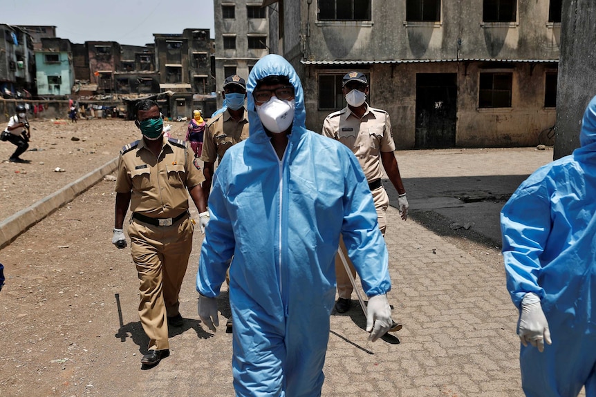 Medical inspectors wearing masks.