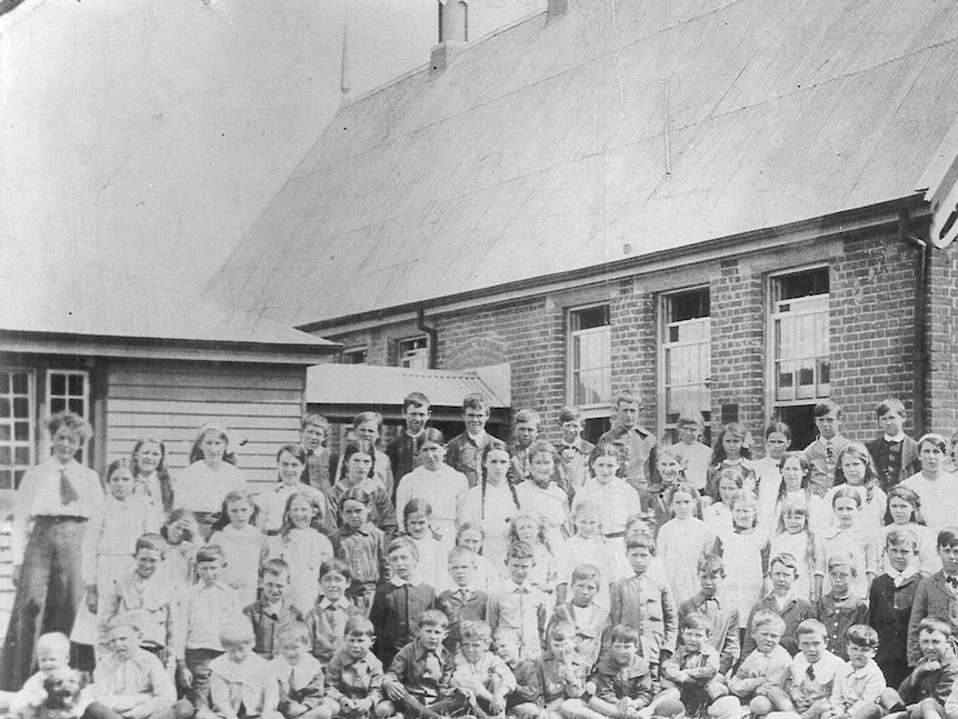An old photo of a class outside a Perth school house