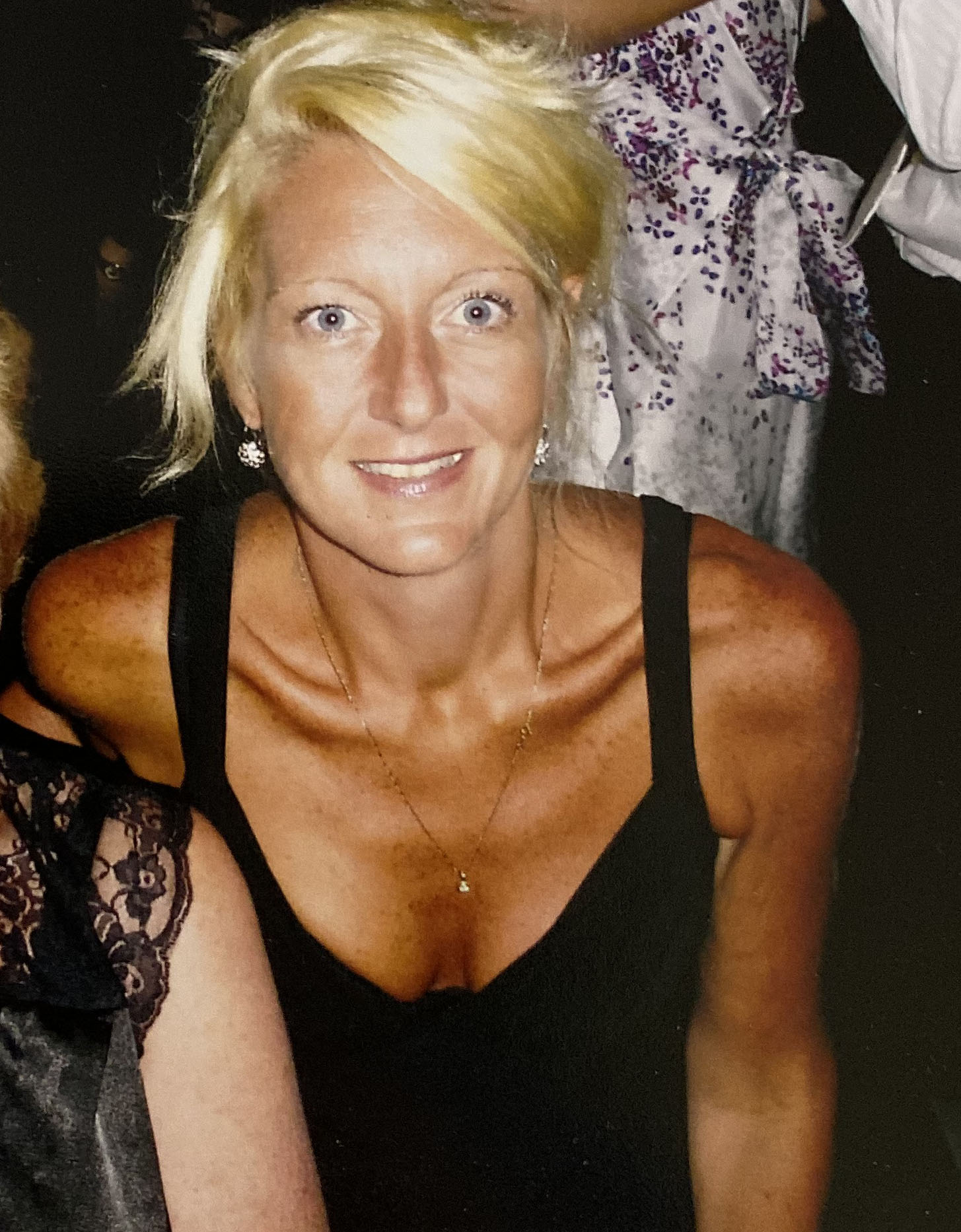 Nicola Gobbo wears a black dress.