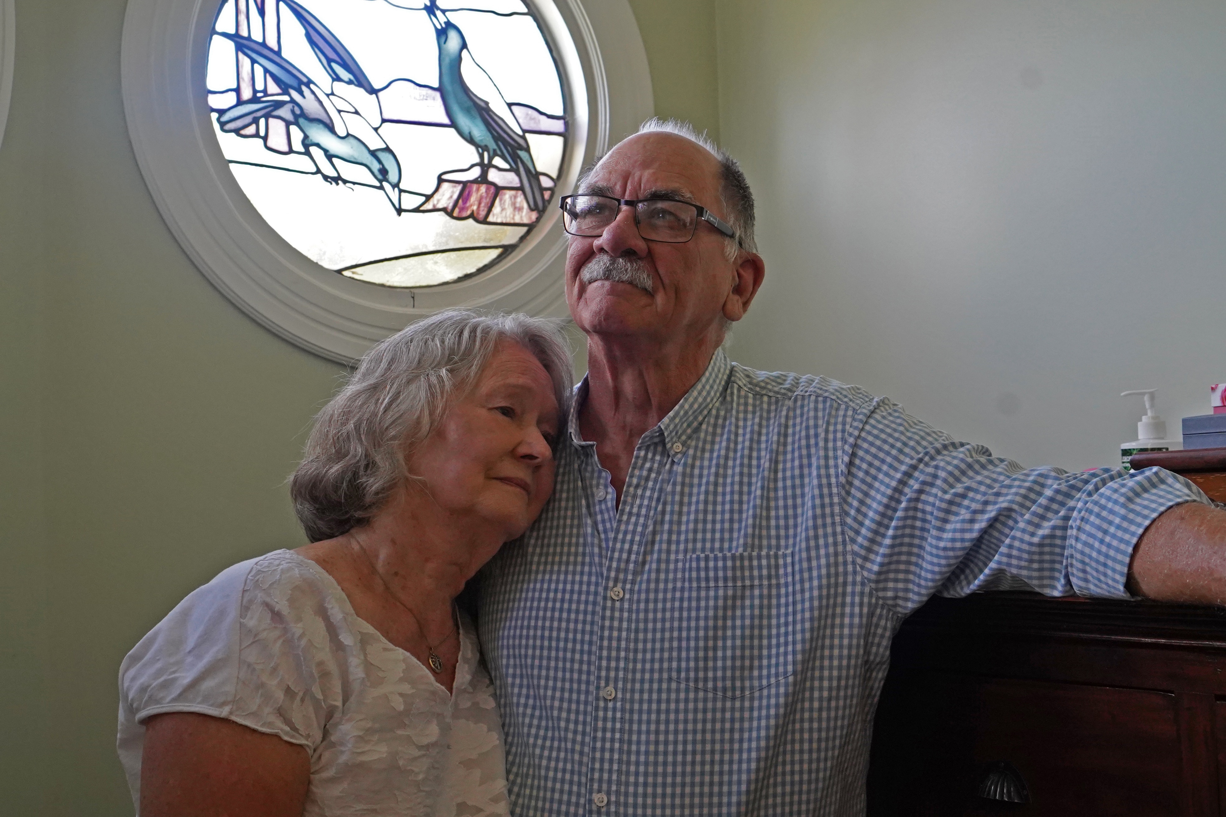 Cracks in the wall and roof of a house.