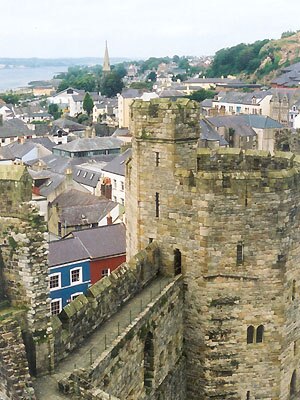 A seaside town, medieval castle in foreground
