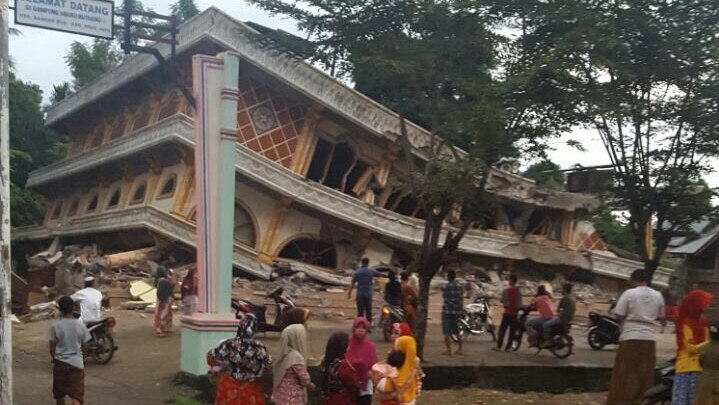 Collapsed building in Indonesia after earthquake. December 7, 2016.