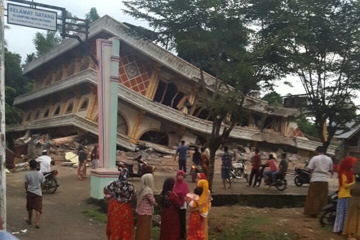 Collapsed building in Indonesia after earthquake. December 7, 2016.