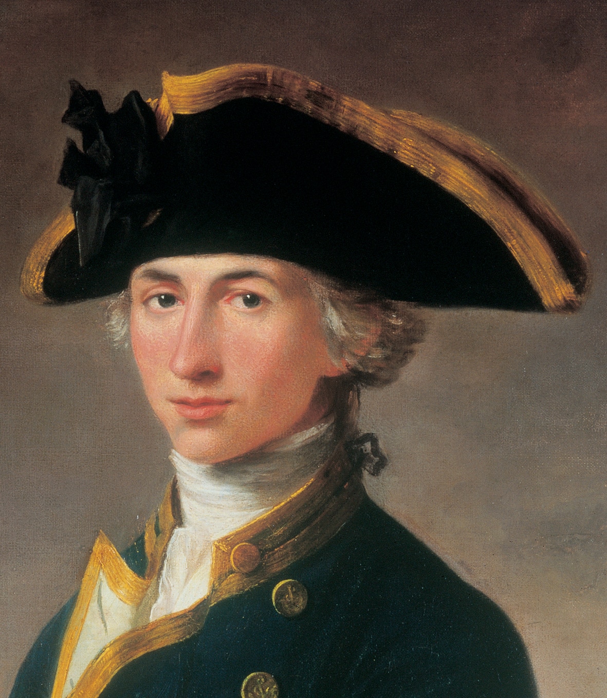 A portrait of a young man in naval uniform.