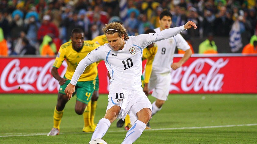 Forlan scores from the penalty spot