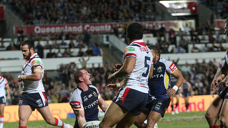 Too good ... Glenn Hall scored North Queensland's first of three tries.