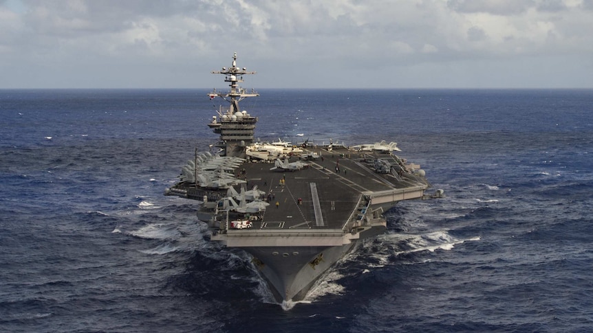 The aircraft carrier USS Carl Vinson transits the Pacific Ocean.