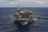 The aircraft carrier USS Carl Vinson transits the Pacific Ocean.