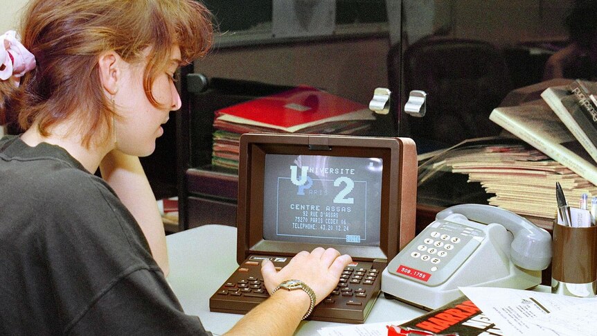 Shutting down: a French woman uses a Minitel in 1989.