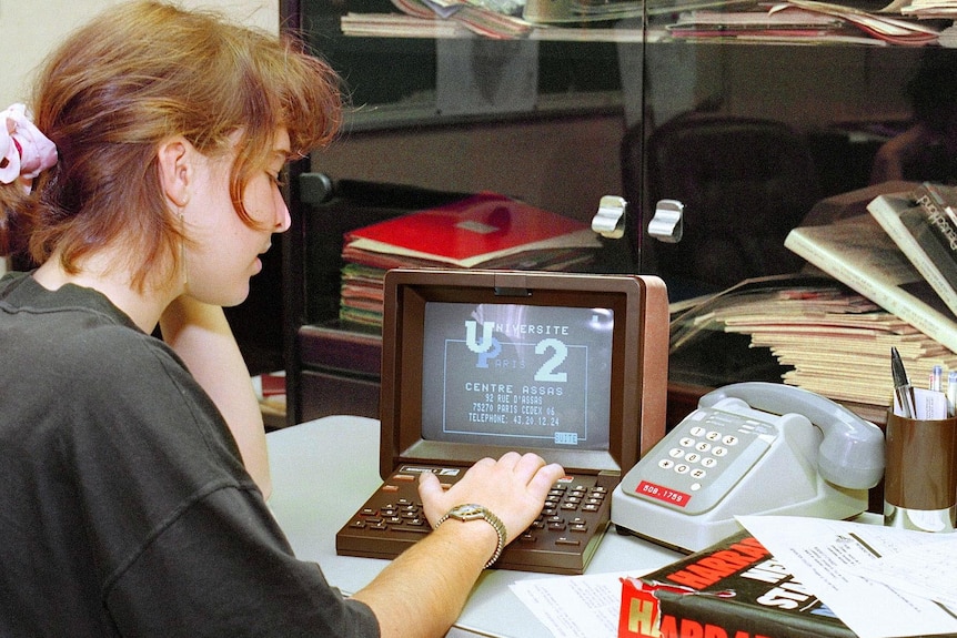 Shutting down: a French woman uses a Minitel in 1989.