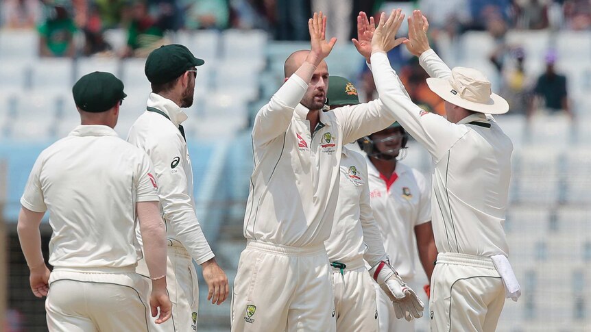 Nathan Lyon celebrates wicket of Mominul Haque